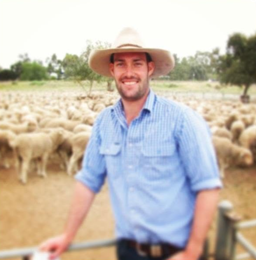 Tom Boyle on the farm with sheep